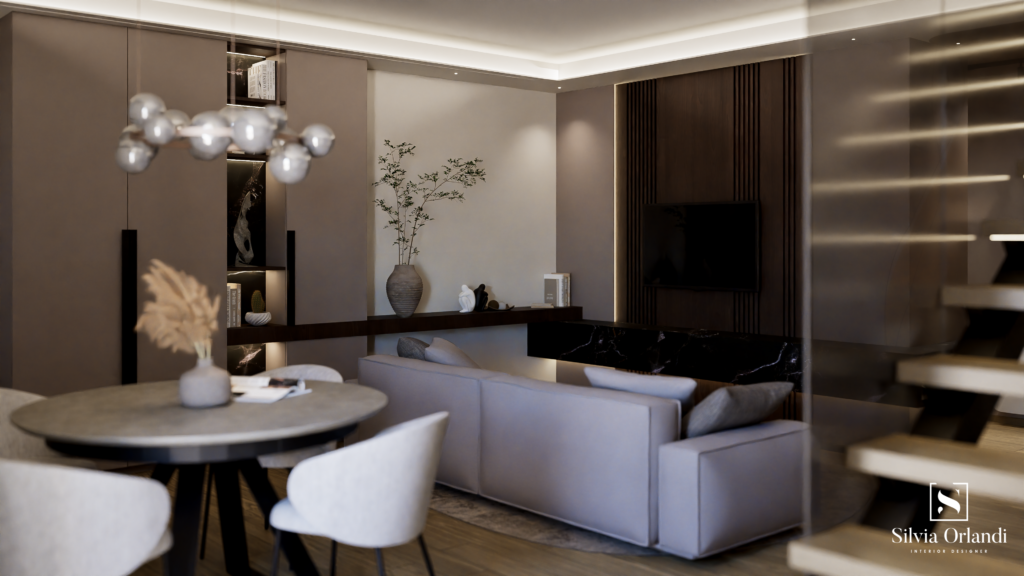 Living in interior design contemporaneo, open space con zona pranzo e relax, palette neutra beige e tortora, divano lineare, tavolo rotondo con sedie imbottite, parete TV con boiserie in legno e inserto in marmo scuro, illuminazione integrata e dettagli decorativi minimal.